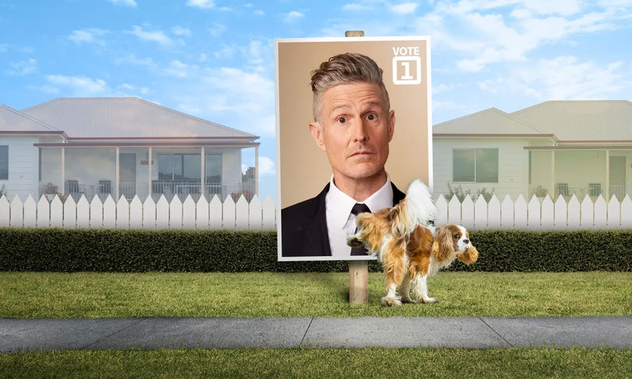 A Vote 1 Wil Anderson poster being pissed on by a dog