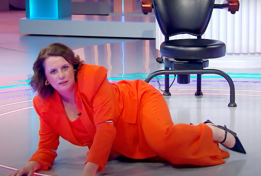 Anne Edmonds posing on the floor of the studio